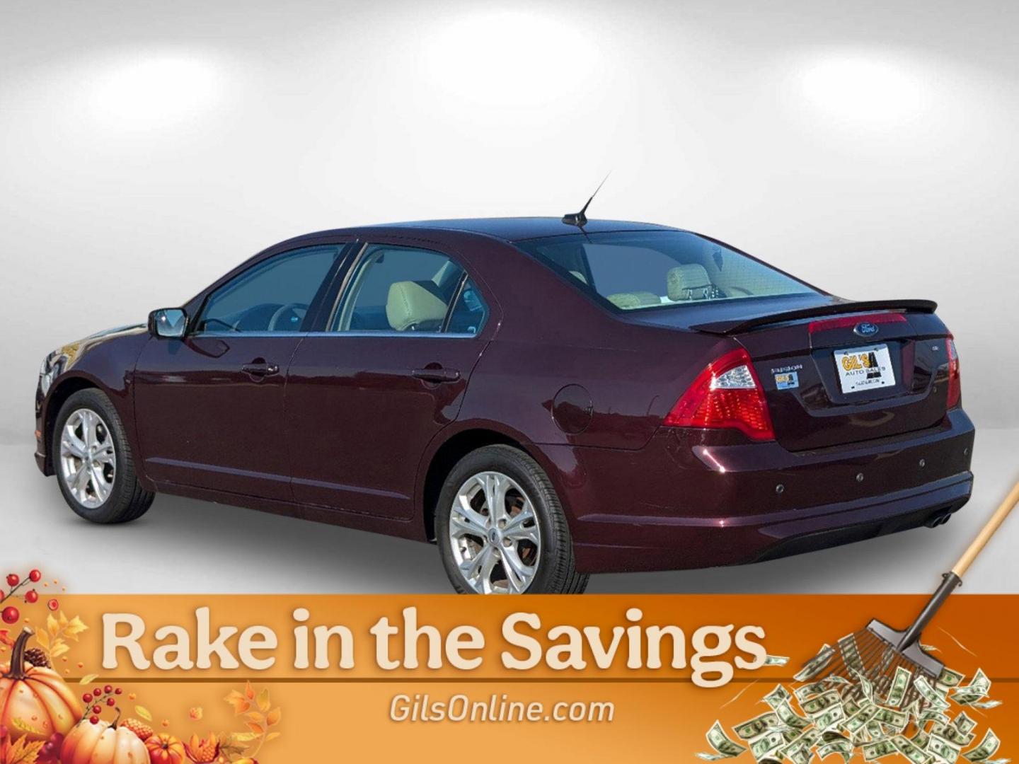 2012 Maroon Ford Fusion SE (3FAHP0HA0CR) with an Gas I4 2.5L/152 engine, 6-Speed Automatic transmission, located at 804 22nd Ave, Phenix City, AL, 36870, (334) 297-1860, 32.484749, -85.024475 - 2012 Ford Fusion SE - Photo#10