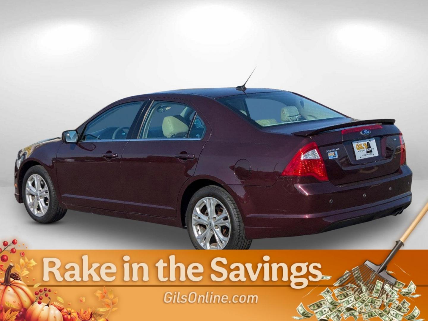 2012 Maroon Ford Fusion SE (3FAHP0HA0CR) with an Gas I4 2.5L/152 engine, 6-Speed Automatic transmission, located at 804 22nd Ave, Phenix City, AL, 36870, (334) 297-1860, 32.484749, -85.024475 - 2012 Ford Fusion SE - Photo#12