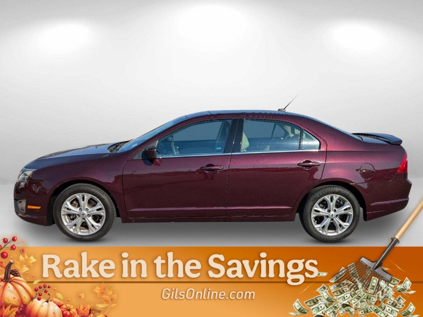 2012 Maroon Ford Fusion SE (3FAHP0HA0CR) with an Gas I4 2.5L/152 engine, 6-Speed Automatic transmission, located at 804 22nd Ave, Phenix City, AL, 36870, (334) 297-1860, 32.484749, -85.024475 - 2012 Ford Fusion SE - Photo#14