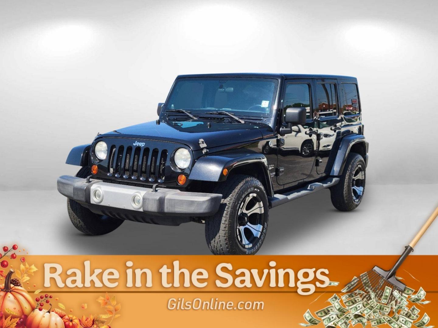 2012 Black /Black Interior Jeep Wrangler Unlimited Sahara (1C4BJWEG4CL) with an Gas V6 3.6L/220 engine, 5-Speed Automatic transmission, located at 1430 Gateway Drive, Opelika, AL, 36801, (334) 239-0944, 32.637871, -85.409790 - 2012 Jeep Wrangler Unlimited Sahara - Photo#0