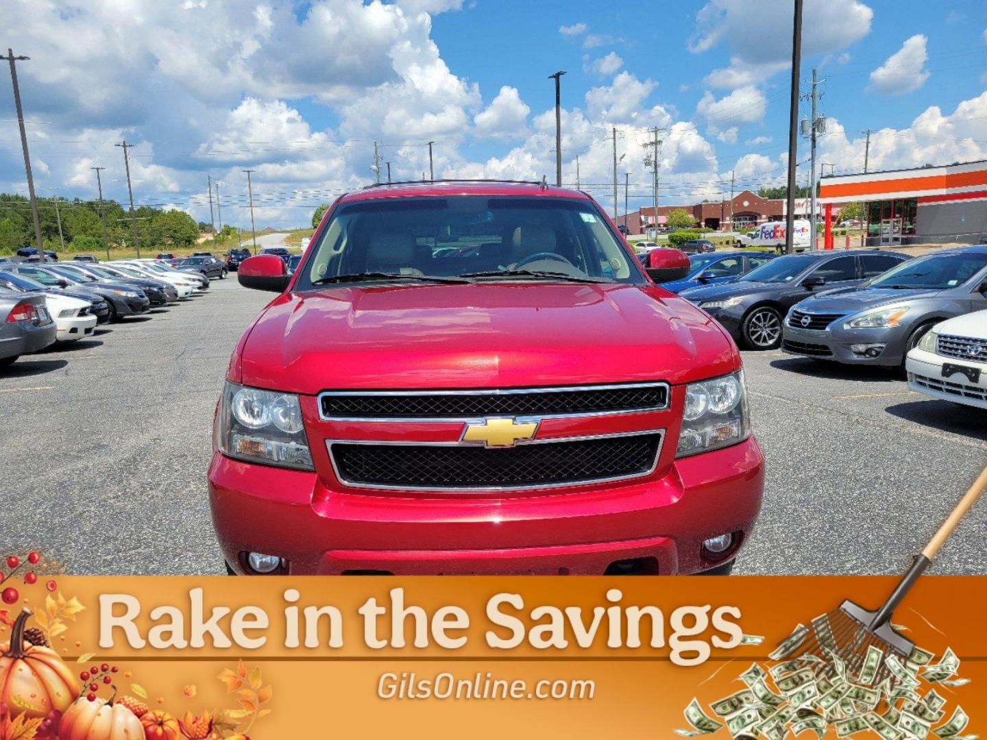 2012 Crystal Red Tintcoat /Light Cashmere/Dark Cashmere Chevrolet Tahoe LT (1GNSKBE05CR) with an Gas/Ethanol V8 5.3L/323 engine, 6-Speed Automatic w/OD transmission, located at 804 22nd Ave, Phenix City, AL, 36870, (334) 297-1860, 32.484749, -85.024475 - 2012 Chevrolet Tahoe LT - Photo#2