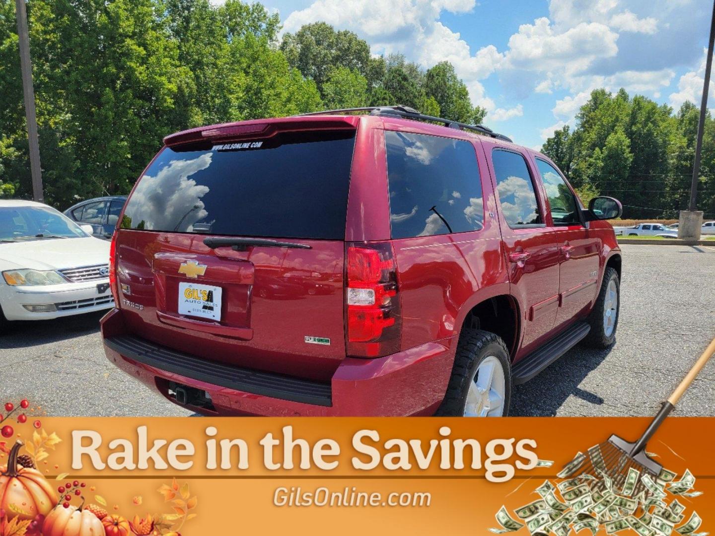 2012 Crystal Red Tintcoat /Light Cashmere/Dark Cashmere Chevrolet Tahoe LT (1GNSKBE05CR) with an Gas/Ethanol V8 5.3L/323 engine, 6-Speed Automatic w/OD transmission, located at 804 22nd Ave, Phenix City, AL, 36870, (334) 297-1860, 32.484749, -85.024475 - 2012 Chevrolet Tahoe LT - Photo#5